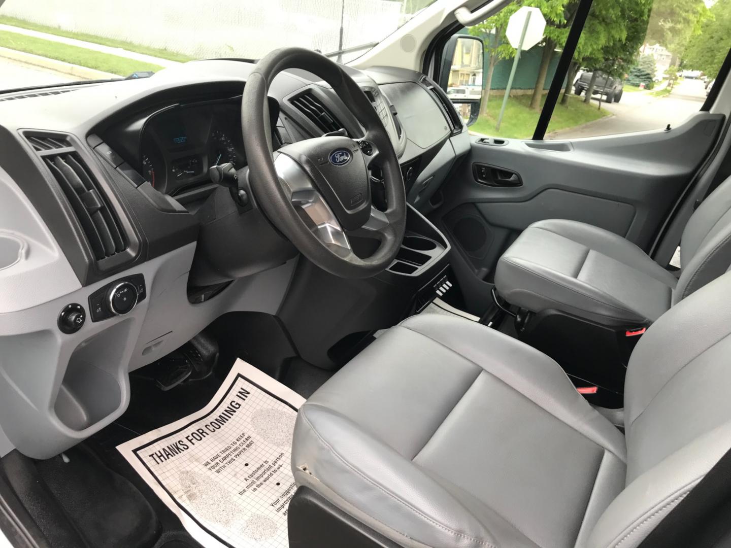 2018 White /Gray Ford Transit 150 (1FTYE1YM1JK) with an 3.7 V6 engine, Automatic transmission, located at 577 Chester Pike, Prospect Park, PA, 19076, (610) 237-1015, 39.886154, -75.302338 - 2018 Ford Transit 150: Dual drop down ladder racks, multiple pieces of shelving, power inverter w/ outlet, heavy duty partition, FLEET MAINTAINED, runs LIKE NEW! This vehicle comes inspected and has been given a bumper to bumper safety check. It is very clean, reliable, and well maintained. We of - Photo#7